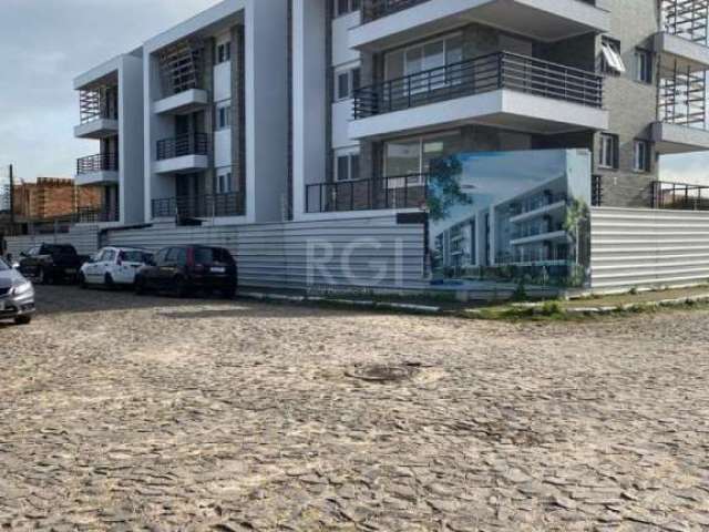 Apartamento com 2 dormitórios, sendo 1 suíte, banheiro social , cozinha, churrasqueira, sacada e área de serviço. O empreendimento tem quatro pavimentos, sendo um subsolo, com um total de quinze apart