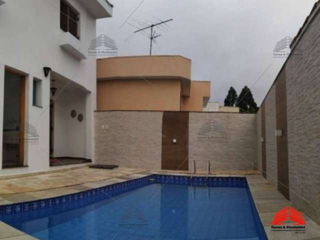 Sobrado à venda, Jd. Textil, 320 m², 3 quartos, 02 suítes com sacada, ampla sala 02 ambientes, lavabo,cozinha planejada, piscina, 04 vagas.