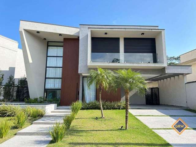 Casa com 6 dormitórios à venda, 435 m² por R$ 7.400.000,00 - Riviera Módulo 24 - Bertioga/SP