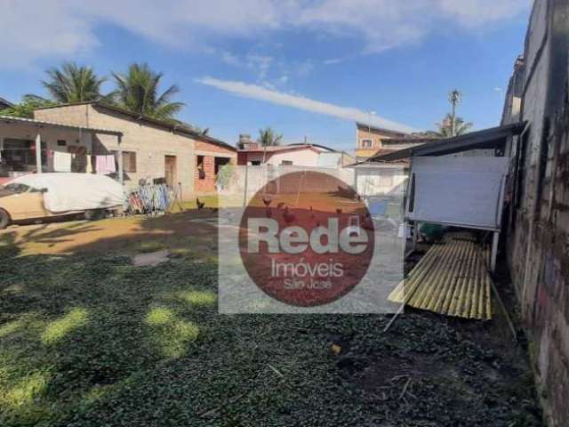 Terreno gigante com 4 casas à venda, 1048 m² por R$ 400.000 - Morro do Algodão - Caraguatatuba/SP