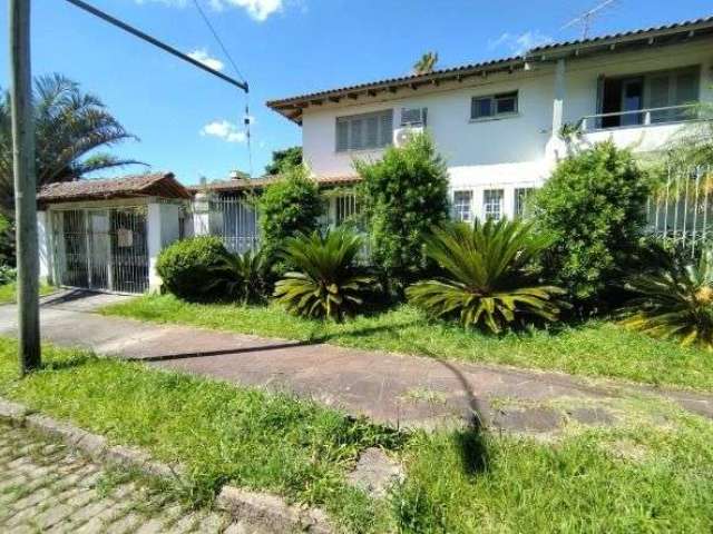 Casa com 3 quartos à venda na Rua Rincão, Ipanema, Porto Alegre, 358 m2 por R$ 649.000