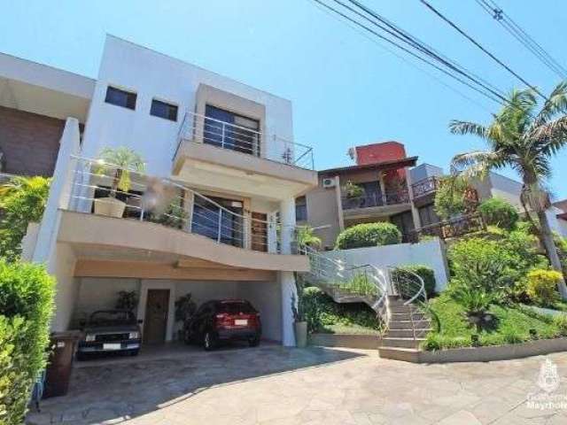 Casa em condomínio fechado com 3 quartos à venda na Avenida Edgar Pires de Castro, --, Hípica, Porto Alegre, 234 m2 por R$ 1.200.000