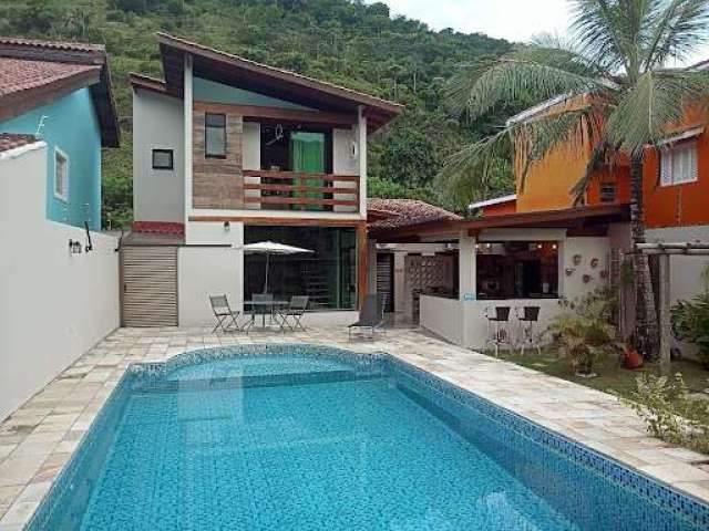 Casa com 3 suítes à venda, 158 m² por R$ 1.200.000 - Praia do Guaiúba / Tombo - Guarujá/SP