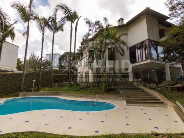 Casa de luxo Chácara Flora 5 suítes, piscina e salão de festa distribuídos em 1.274m² de terreno