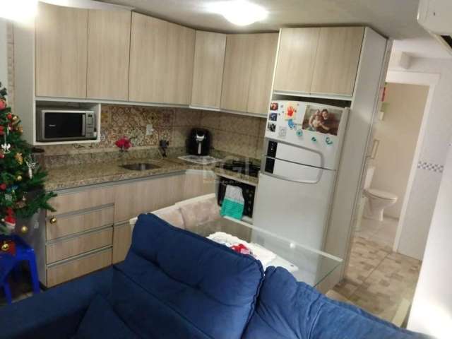 Apartamento 2 quartos, sala, cozinha, área de serviço, banheiro. Estacionamento rotativo, praça, churrasqueira, portaria 24 hs.