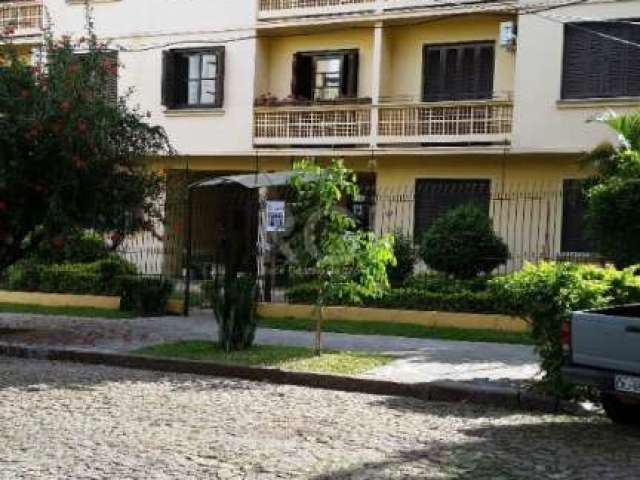 AMPLO Apartamento de 02 dormitórios, lavabo, living 2 ambientes com lareira, cozinha americana, churrasqueira, área de serviço/despensa . Excelente localização no bairro Santana próximo à diversos pon