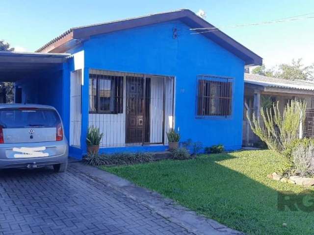 Vendo casa de dois dormitórios, sala, cozinha, um banheiro amplo, pátio de frente e fundos, portão eletrônico, possui poço artesiano, garagem para dois carros e sem risco de Alagamento.