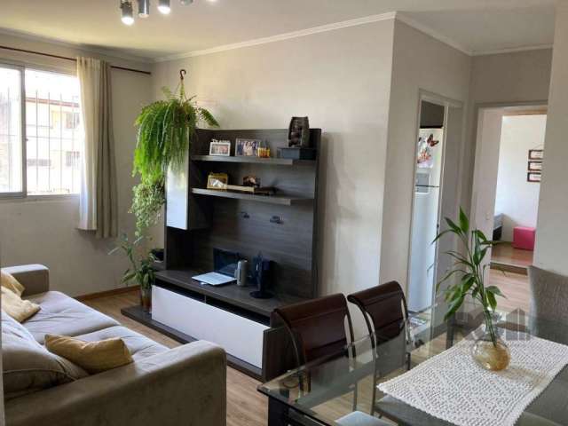 Oportunidade imperdível! Apartamento à venda na zona norte de Porto Alegre. Localizado em um bairro privilegiado, este charmoso apartamento de dois dormitórios oferece conforto e praticidade.&lt;BR&gt