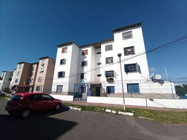 Apartamento de 2 dormitórios, living 2  ambientes; banheiro social com box de vidro, cozinha e área de serviço. Peças amplas e bem iluminadas, condomínio com estacionamento.  Vaga Rotativa.&lt;BR&gt;A