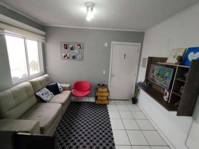 Lindo Apartamento em andar alto, 2 dormitórios, sala e cozinha integrada, banheiro social com box de vidro, 1 vaga de garagem, fica moveis planejados da cozinha, condomínio com infra, playground, quad