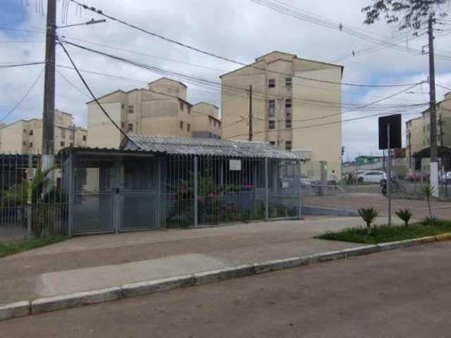 Apartamento no bairro Vila Nova, de 2 dormitórios, living para 2 ambientes, cozinha e banheiro social. Condomínio com portaria, quiosque com churrasqueira, mercado self-service, academia ao ar livre, 