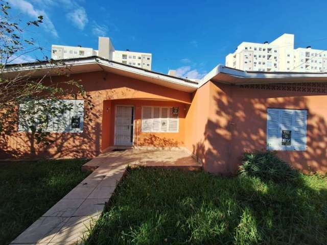 Casa na Rua Nilo Ruschel,  Morro Santana,  em terreno de esquina com área total de 285 m², 3 dormitórios, sala, cozinha, despensa, dois banheiros, área de serviço com tanque de alvenaria, área externa