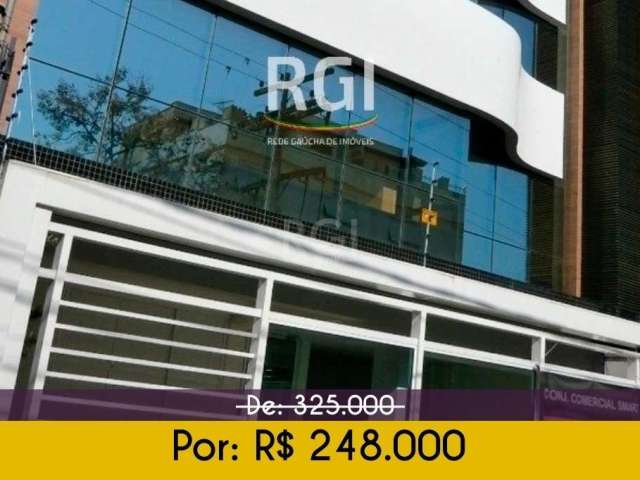 Conjunto/Sala comercial a venda, com 1 vaga de garagem, no bairro Auxiliadora em Porto Alegre.&lt;BR&gt;Sala no bairro Auxiliadora com 30,00 m² privativos, banheiro auxiliar, com 1 (uma) vaga de garag