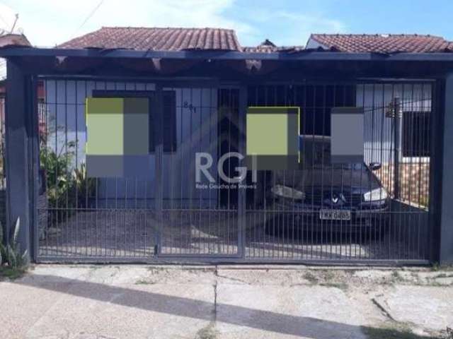 vende linda casa com dois dormitórios, sala, cozinha ampla com ilha gourmet, banheiro social amplo, churrasqueira, banheiro auxiliar. Garagem para 2 carros e lavanderia. Aceita financiamento e estuda 