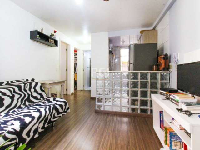 APARTAMENTO 2 DORMITÓRIOS 1 VAGA  NO PARQUE SANTA FÉ EM PORTO ALEGRE. Excelente apartamento todo em laminado, com 2 dormitórios, living integrado a cozinha, área de serviço e banheiro social. Imóvel n