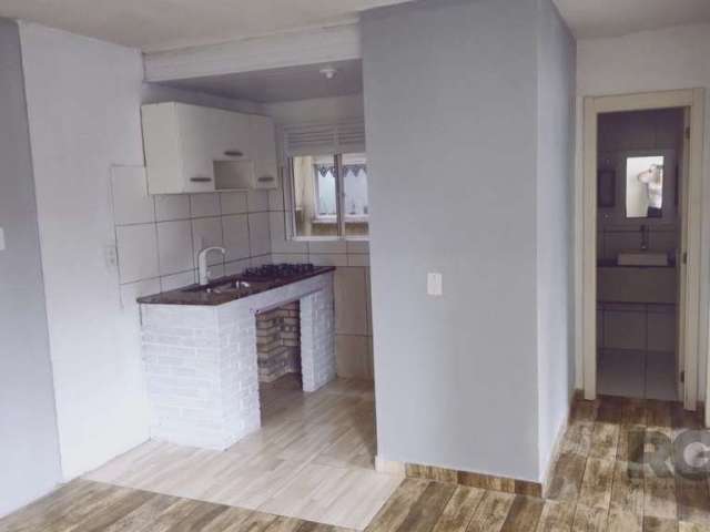 Apartamento 2 dormitórios fundos, com garagem, bairro Restinga- Porto Alegre&lt;BR&gt;Ótimo apto 2 dormitórios lateral, living para 2 ambientes,  cozinha e banheiro com armários, área de serviço separ