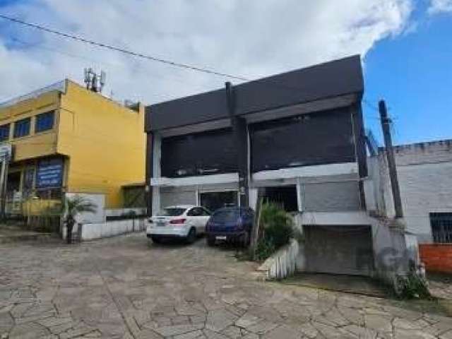 Libertas Imobiliária aluga loja com 450m² de área privativa, localizado no bairro Vila Jardim. Imóvel com recepção, amplo salão, mezanino, pé direito amplo, cortinas de ferro, fachada com vidro e 2 ba