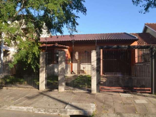 Casa térrea com 178,79m² privativos distribuídos em living para dois ambientes, 3 dormitórios sendo 1 suíte, banheiro social, cozinha, lavanderia, salão de festas com churrasqueira, banheiro auxiliar,