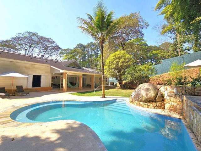 Casa com 4 suítes, casa de hóspedes e área gourmet completa por R$3.950.000,00.