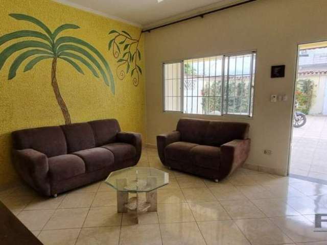 Casa com 3 quartos para alugar na Paschoal Fernandes, 215, Sítio do Campo, Praia Grande por R$ 4.000