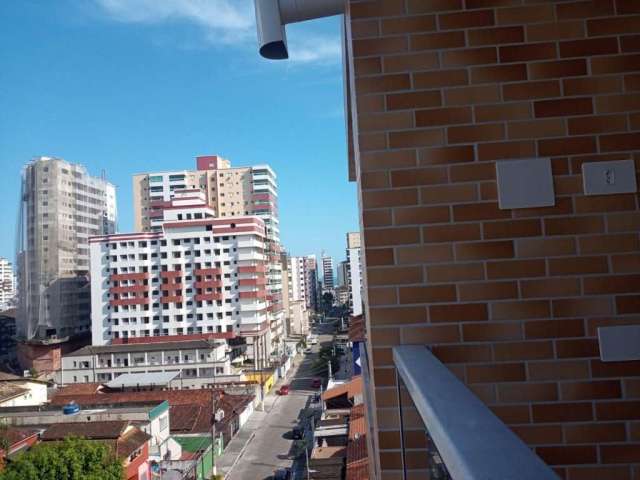 Apartamento com 2 dormitórios à venda, 58 m² por R$ 429.000,00 - Vila Guilhermina - Praia Grande/SP