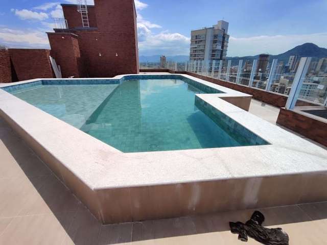 Apartamento com 2 dormitórios à venda, 73 m² por R$ 612.000,00 - Vila Guilhermina - Praia Grande/SP