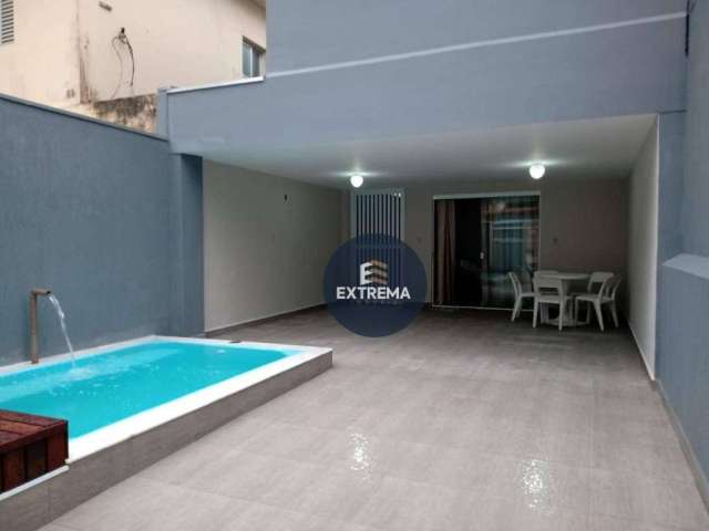 Casa com 3 dormitórios à venda, 129 m² por R$ 625.000,00 - Caiçara - Praia Grande/SP