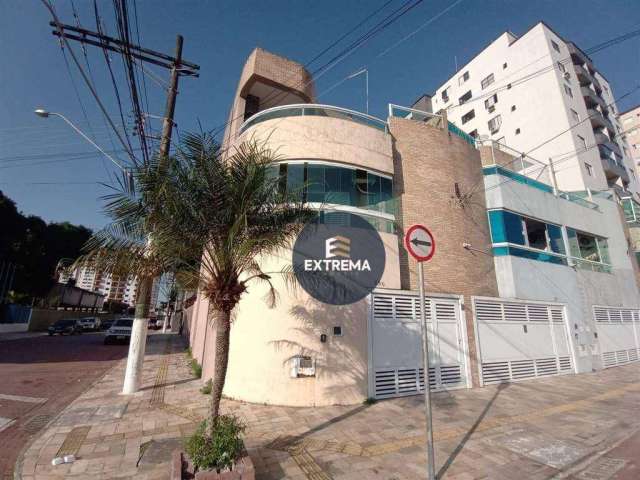 Casa com 3 dormitórios à venda, 264 m² por R$ 778.000 - Tupi - Praia Grande/SP