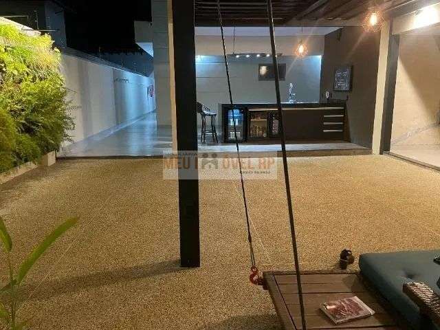 Casa com 3 dormitórios à venda, 320 m² por R$ 955.000 - Jardim Anhangüera - Ribeirão Preto/SP