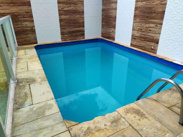 Sobrado com piscina 400m2 construídos, 4 suítes.