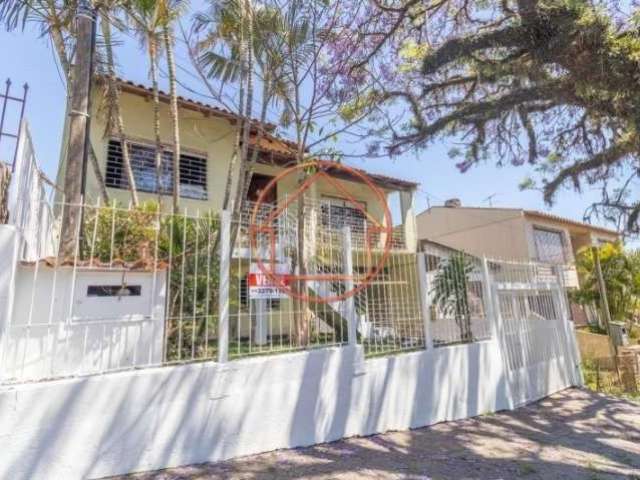 Casa com 5 quartos à venda na Rua Batista Xavier, 423, Partenon, Porto Alegre por R$ 450.000