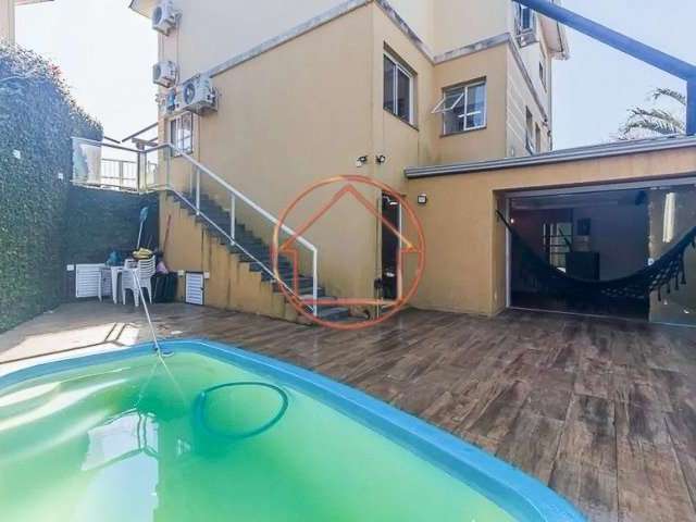 Casa em condomínio fechado com 3 quartos à venda na Rua Vicenza, 20, Mário Quintana, Porto Alegre por R$ 595.000