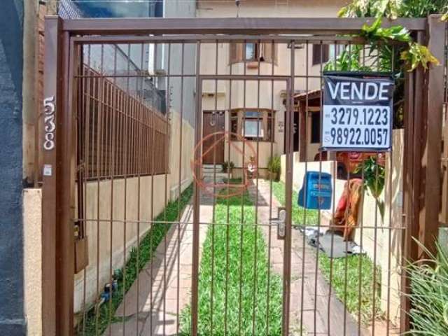 Casa com 2 quartos à venda na Rua Professora Ziláh Totta, 538, Jardim Leopoldina, Porto Alegre por R$ 450.000