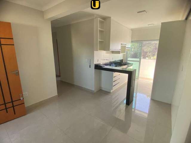 Apartamento à venda em Uberlândia-MG, no bairro Santa Mônica: 2 quartos, 2 salas, 1 banheiro, 1 vaga de garagem!