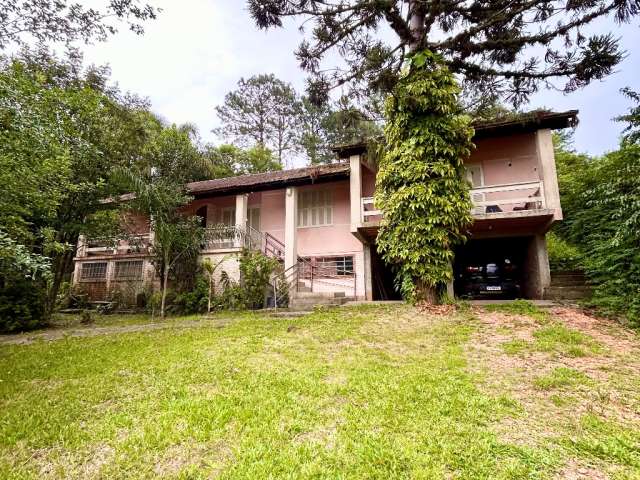 Casarão em frente ao lago Tarumã