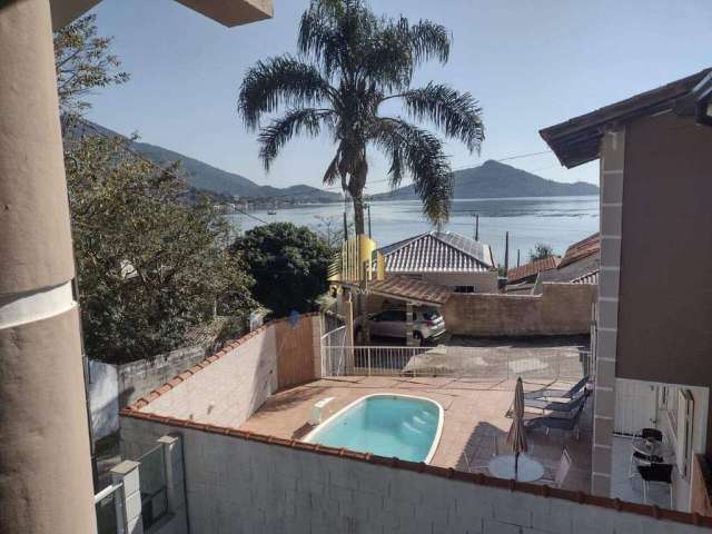 Casa à venda, no Bairro Guarda do Embaú, Palhoça-SC, com 3 quartos, sendo 1 suíte, com 2 vagas