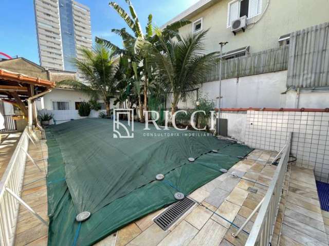 Comprar casa com piscina em Santos