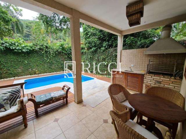 Casa com piscina em Camburi