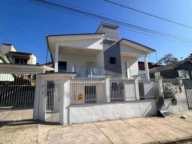 casa com 4 quartos, 1 suíte, 2 vagas garagem