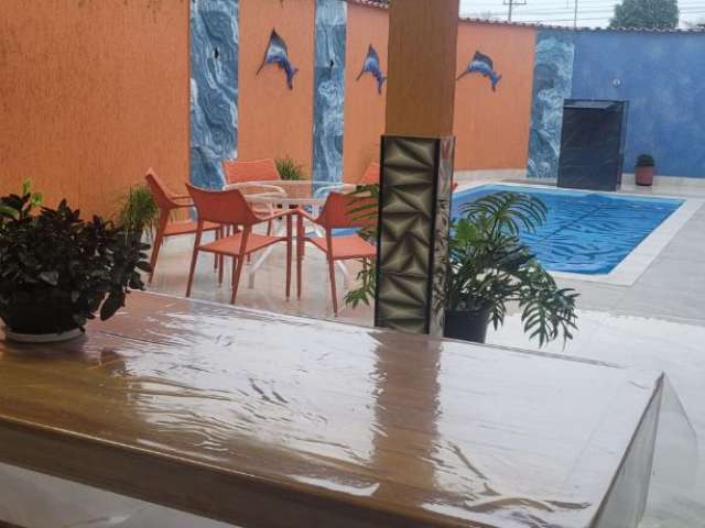 Linda casa com piscina, aconchegante na praia do Indaiá, Bertioga- São Paulo.