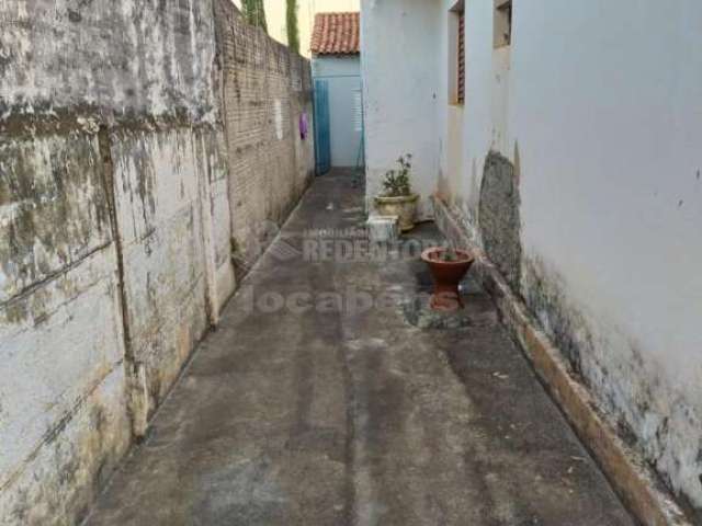 Terreno com 3 casas Vila Ideal