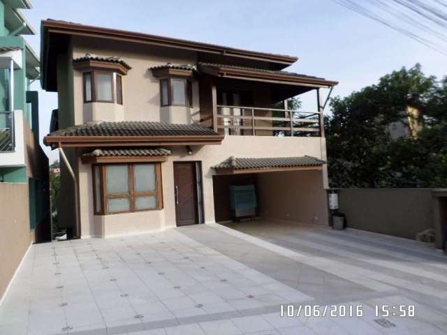 Casa residencial à venda, Condomínio Country Club, Arujá - CA0368.