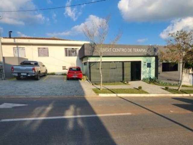 Sala comercial com recepção e estacionamento