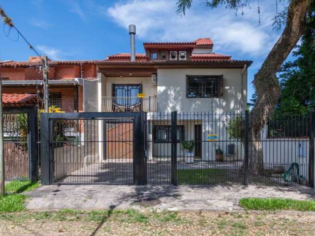 Casa com 3 quartos à venda na Rua Cassino, 75, Ipanema, Porto Alegre por R$ 980.000