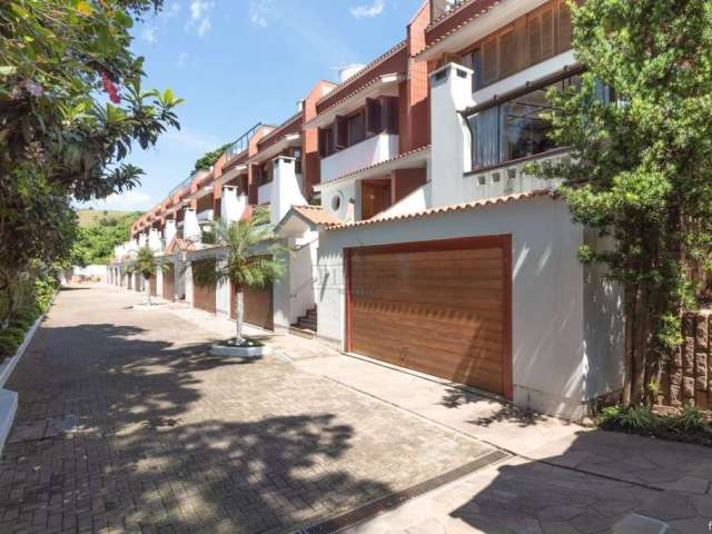 Casa em condomínio fechado com 3 quartos à venda na Avenida Taquary, 160, Cristal, Porto Alegre por R$ 1.190.000