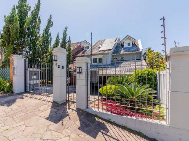 Casa com 3 quartos à venda na Rua General Tadeusz Kosciuszko, 52, Jardim Isabel, Porto Alegre por R$ 1.200.000