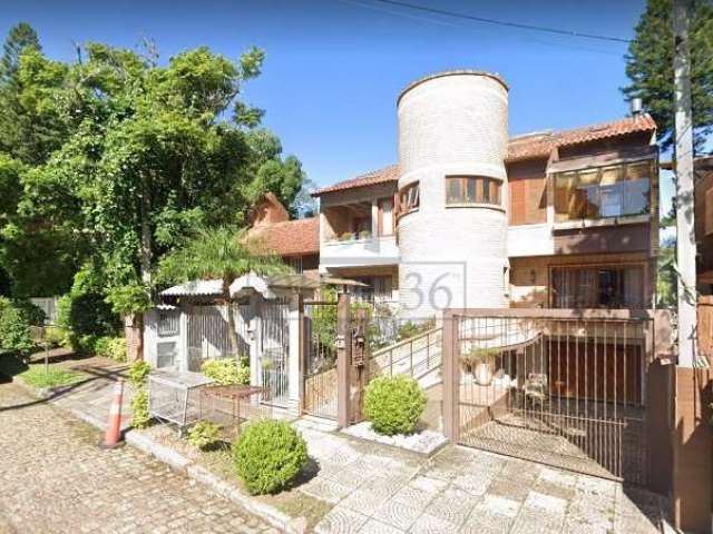 Casa com 3 quartos à venda na Travessa Pedra Redonda, 377, Jardim Isabel, Porto Alegre por R$ 1.300.000