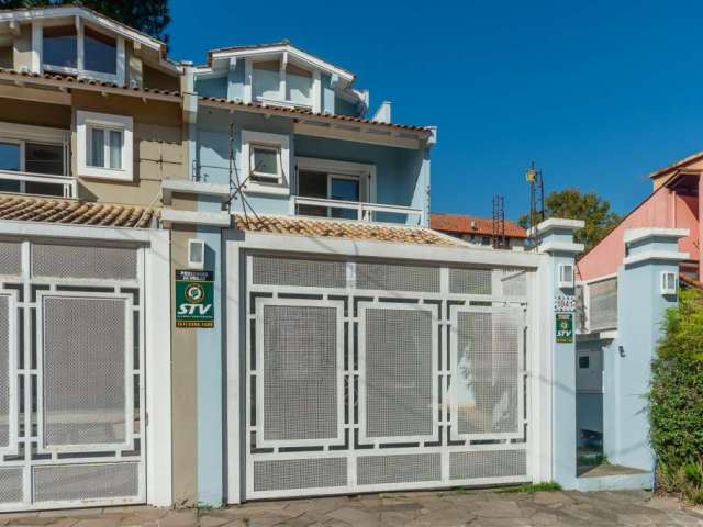 Casa com 3 quartos à venda na Rua Padre João Batista Reus, 1941, Camaquã, Porto Alegre por R$ 690.000