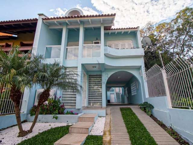 Casa com 3 quartos à venda na Rua Manauê, 174, Vila Assunção, Porto Alegre por R$ 1.100.000