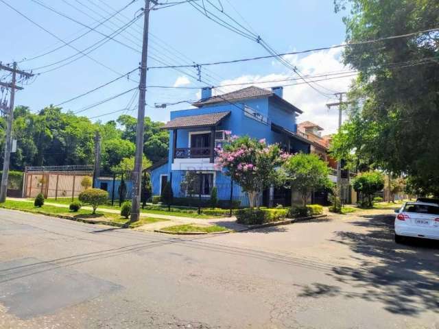 Casa com 3 quartos à venda na Avenida Guaíba, 11800, Ipanema, Porto Alegre por R$ 1.250.000